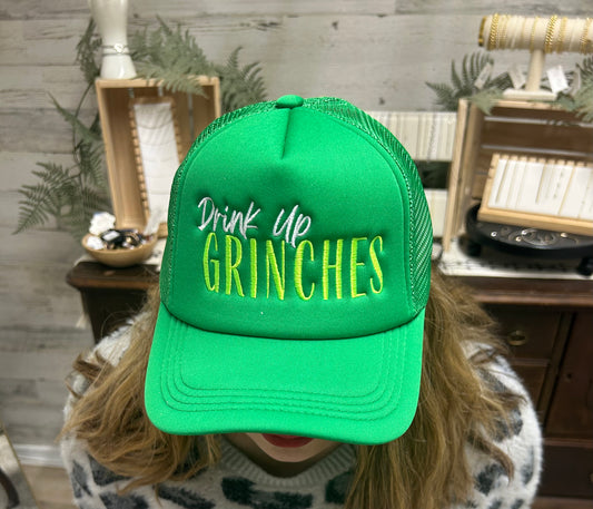 Drink Up Grinches Trucker Hat